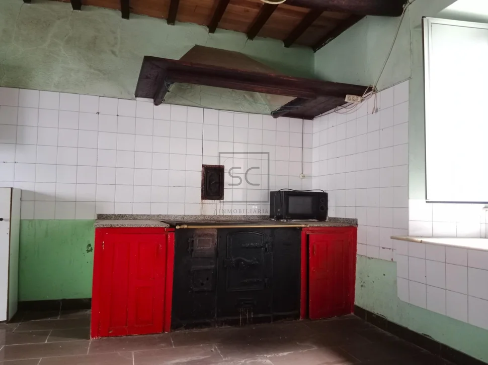 Casa con bodegas y finca