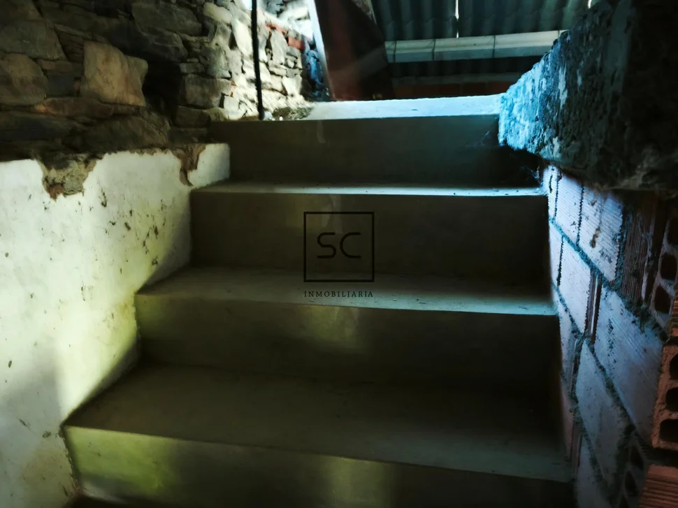 Casa de piedra con garaje y finca en cerdido