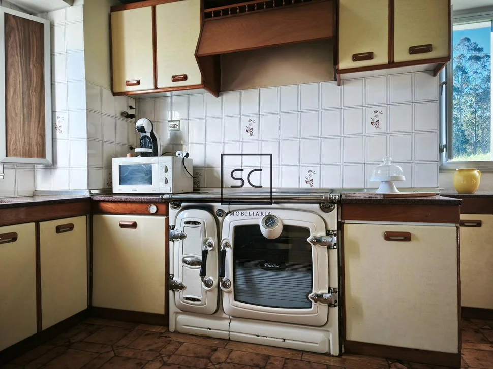 Casa de piedra con garaje y finca en cerdido