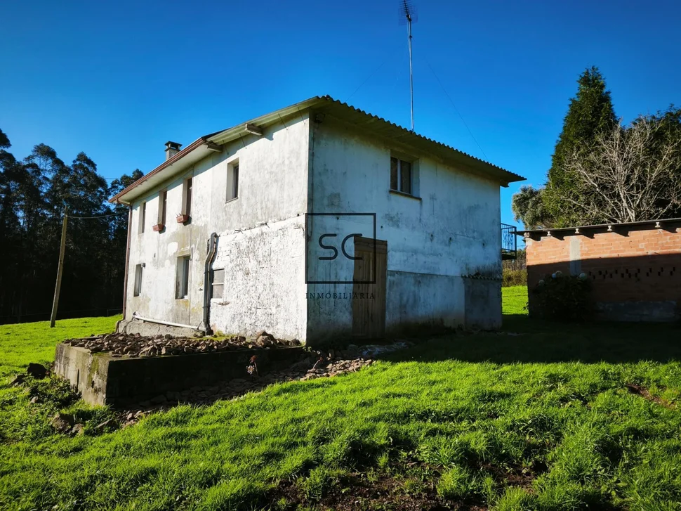 Casa de piedra con garaje y finca en cerdido