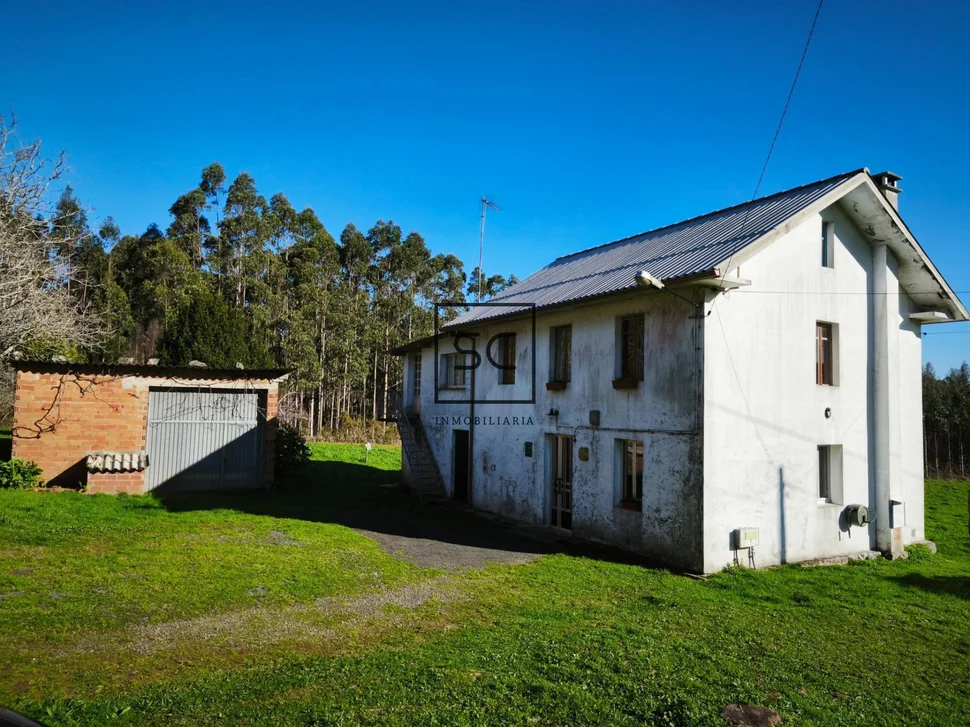 Casa de piedra con garaje y finca en cerdido
