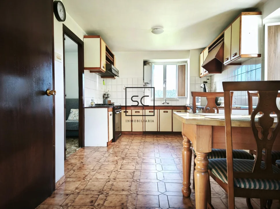 Casa de piedra con garaje y finca en cerdido