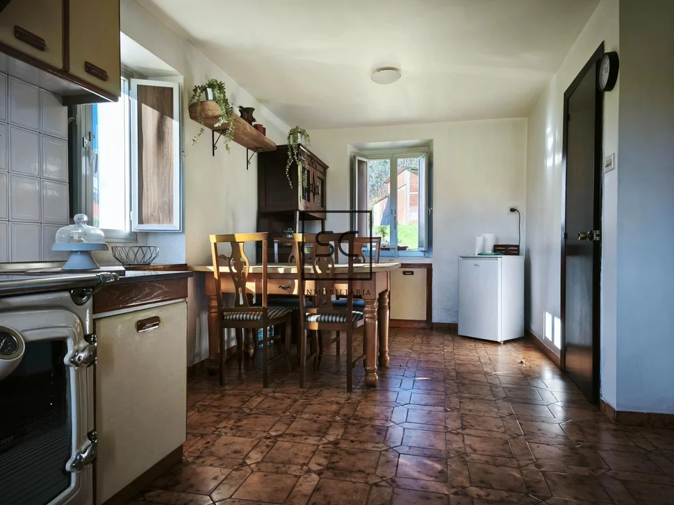 Casa de piedra con garaje y finca en cerdido