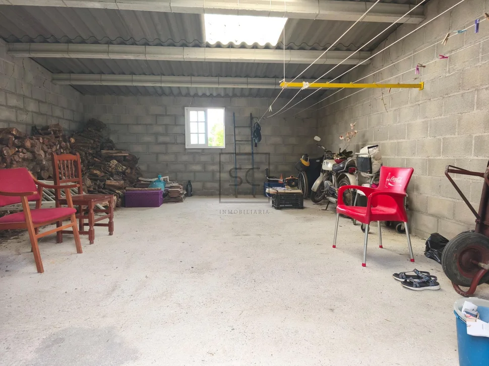 Casa de piedra con hórreo y finca en san sandurniño