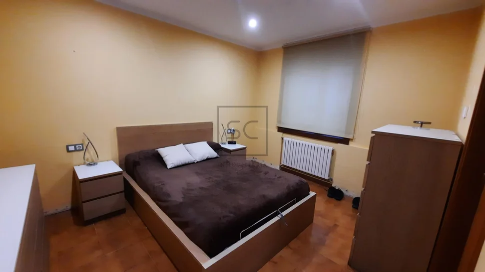 Chalet adosado con finca en Neda