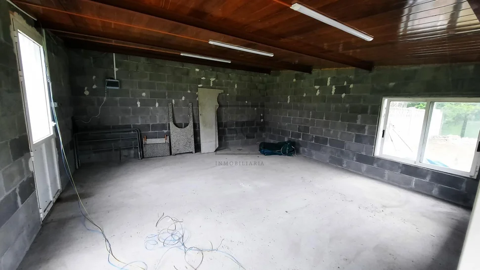 Chalet adosado con finca en Neda
