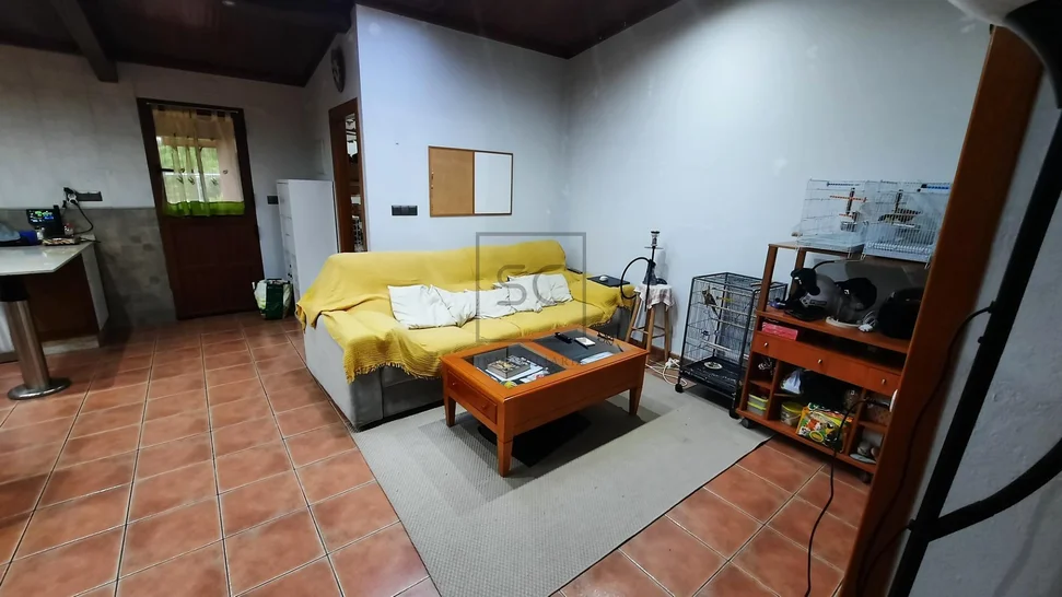 Chalet adosado con finca en Neda