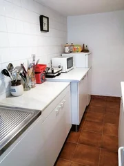 Casa adosada y totalmente amueblada con finca anexada