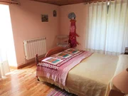 Casa adosada y totalmente amueblada con finca anexada