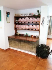 Casa adosada y totalmente amueblada con finca anexada