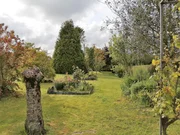 Casa adosada y totalmente amueblada con finca anexada