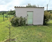 Casa adosada y totalmente amueblada con finca anexada