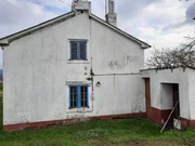 Casa de piedra para reformar con finca opcionable