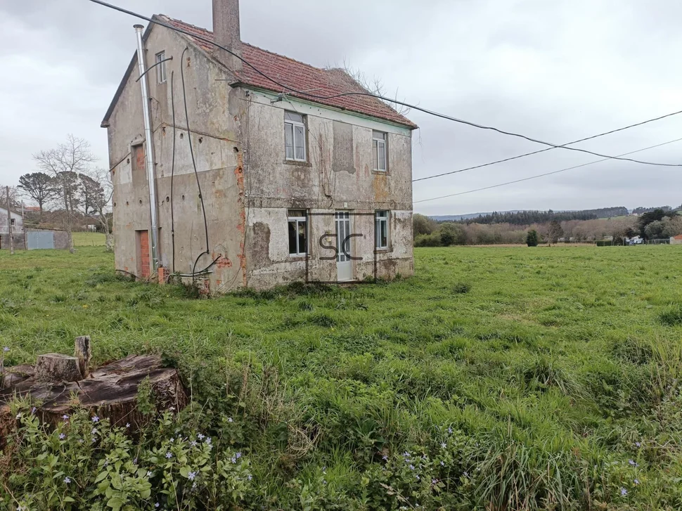 Terreno edificable con casa para reformar