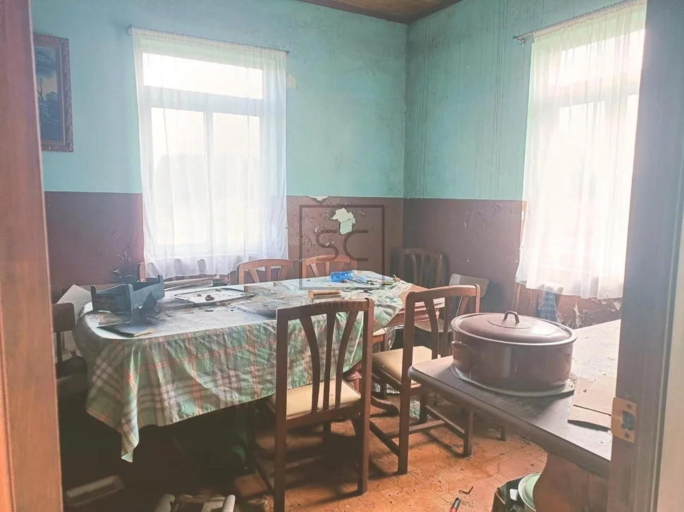 Terreno edificable con casa para reformar