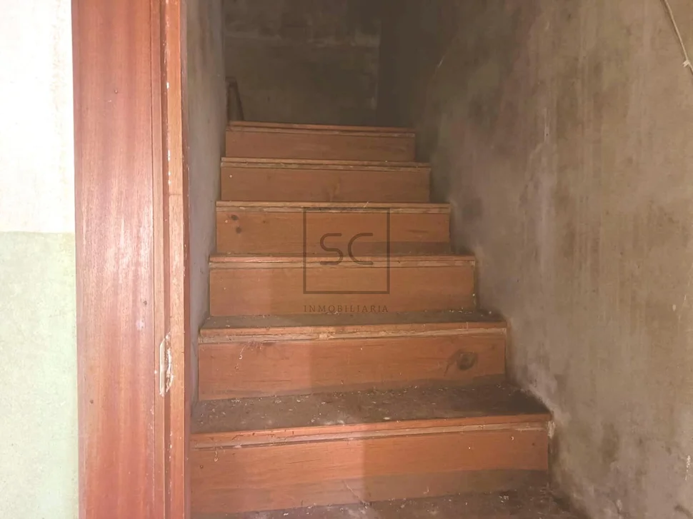 Terreno edificable con casa para reformar