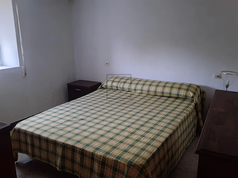 Casa adosada con finca urbanizable en mandiá-ferrol