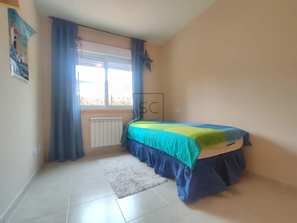 Bajo vivienda con terraza de 38 mts en Miño