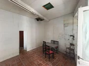 Casa adosada en el centro de Cariño.